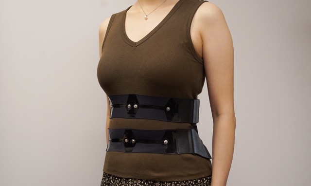 GummiSoma: Co-Designing a Carbon-Nanotube Strain-Sensing Garment for Respiratory Tracking in Vocal Performance